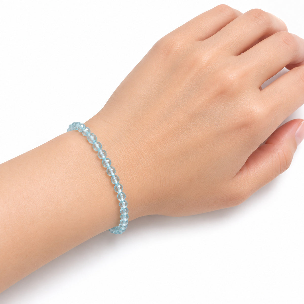 Blue Topaz Fine Bead Bracelet — wrist angle