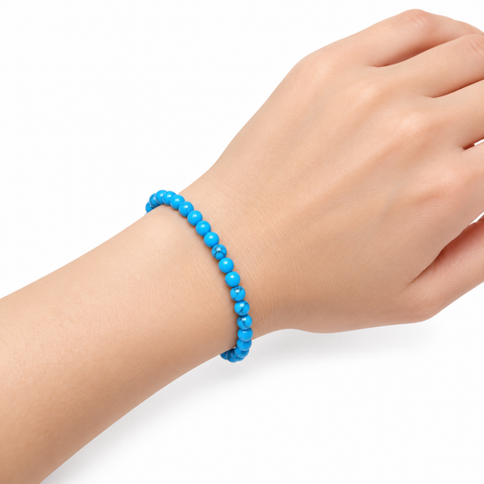 Blue Howlite Fine Bead Bracelet — wrist angle