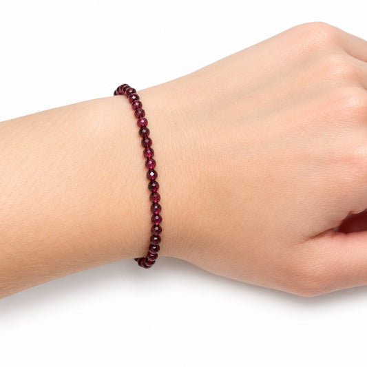 Garnet Fine Bead Bracelet — wrist angle
