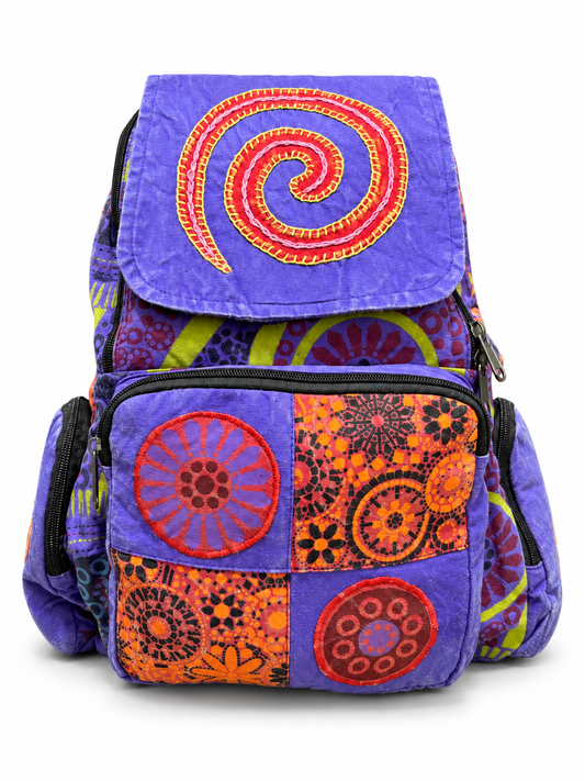 Purple Orange Spiral Patchwork Backpack — front view
