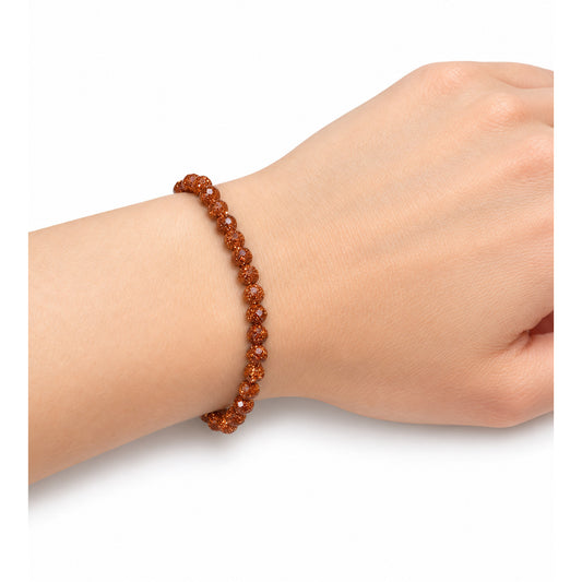 Red Goldstone Bead Bracelet — wrist angle