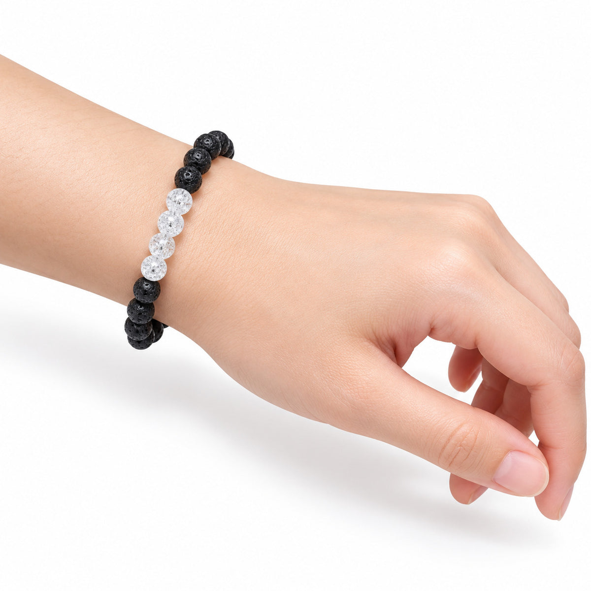 Cracked Crystal Quartz and Black Bead Bracelet — wrist side view