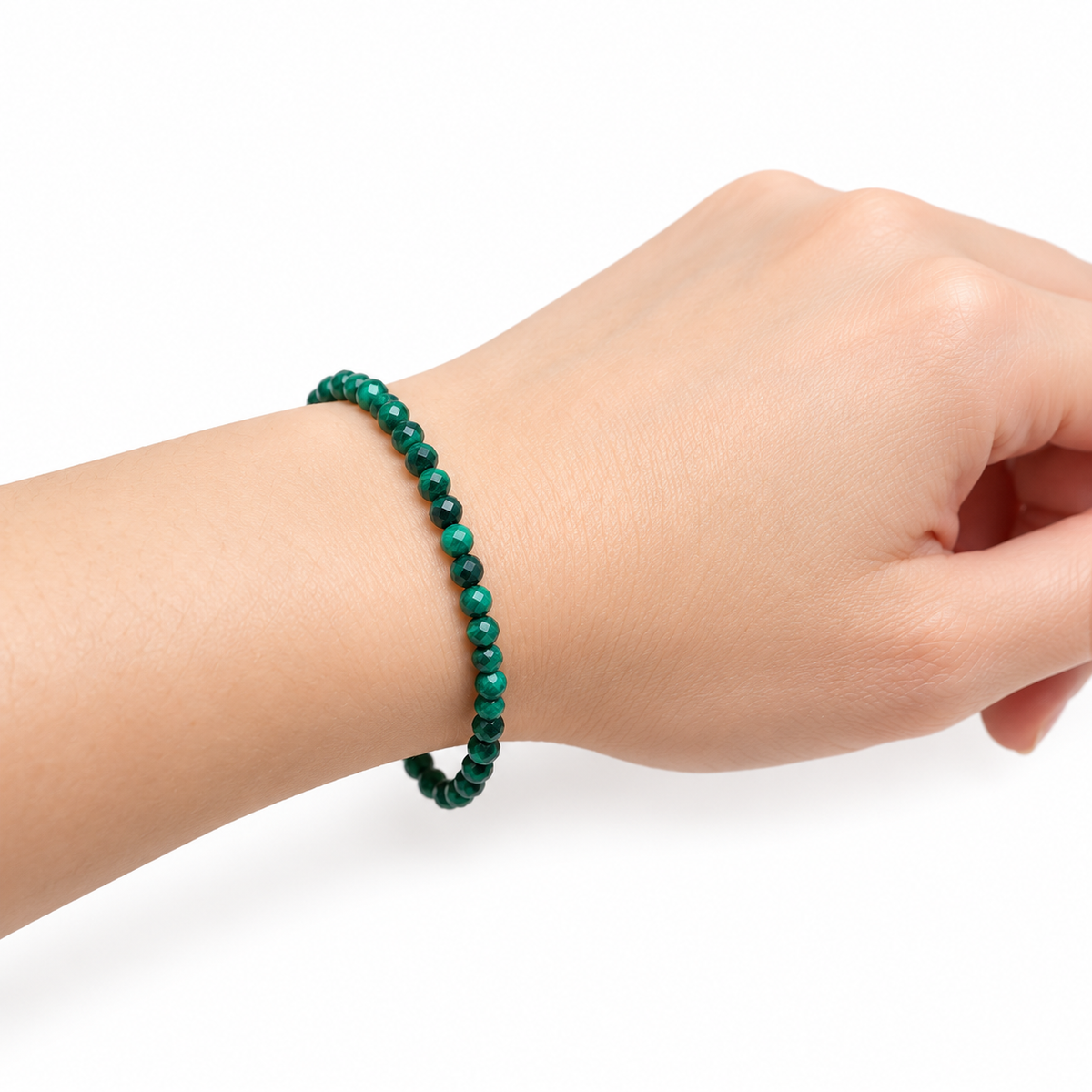 Malachite Fine Bead Bracelet — wrist side view