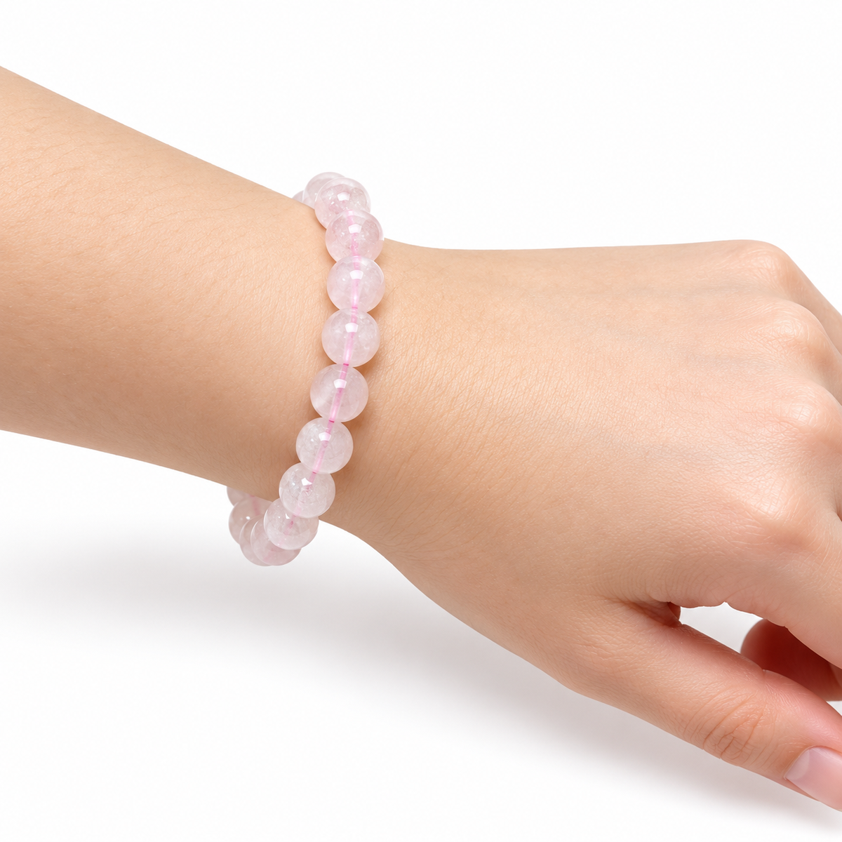 Rose Quartz Bead Bracelet — wrist side view