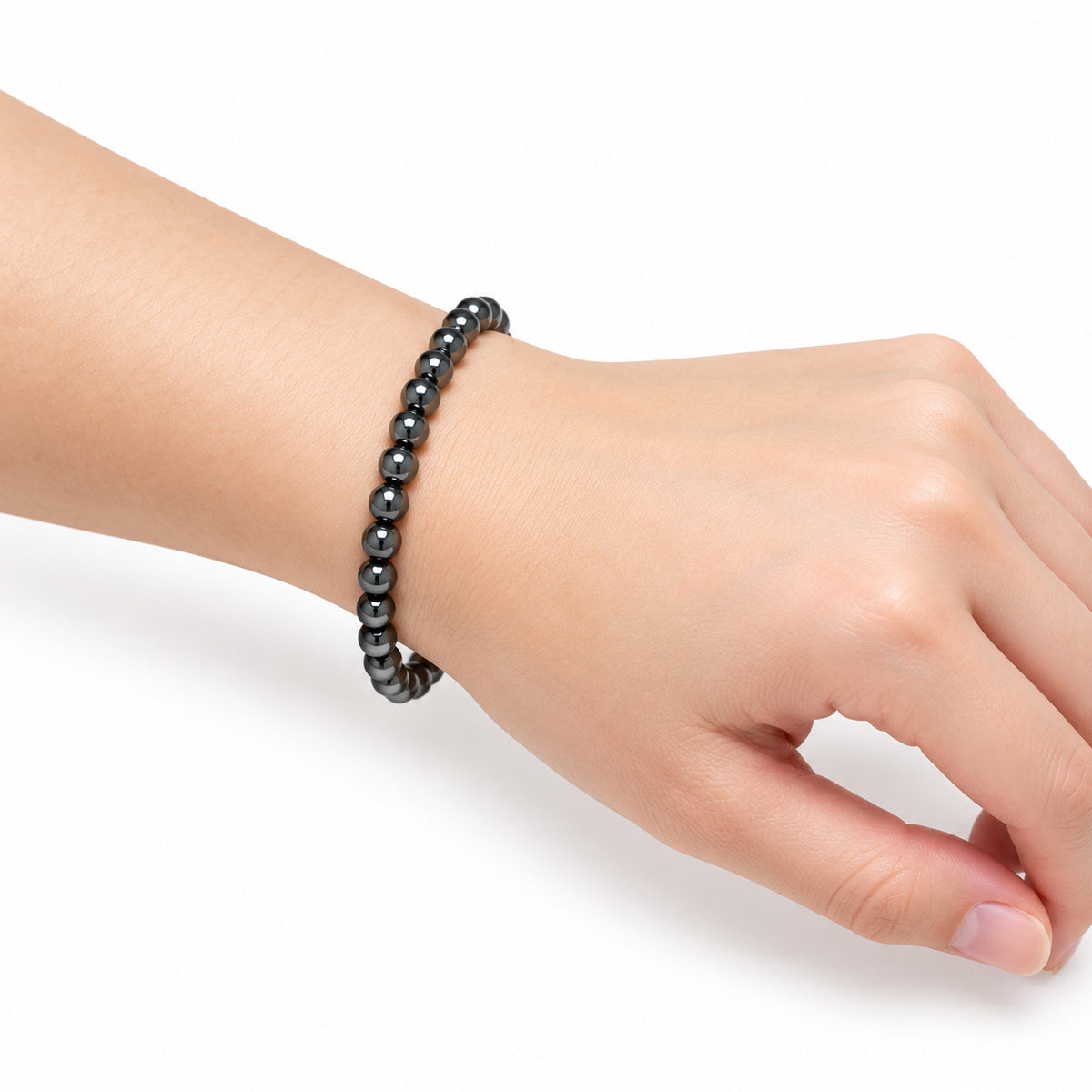 Hematite Fine Bead Bracelet — wrist side view