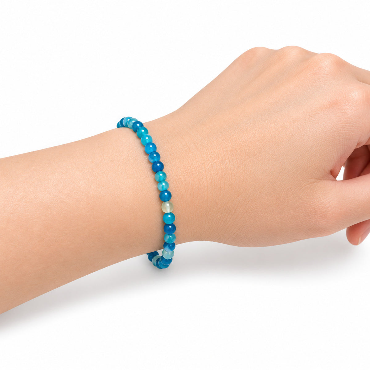 Blue Agate Fine Bead Bracelet — wrist side view