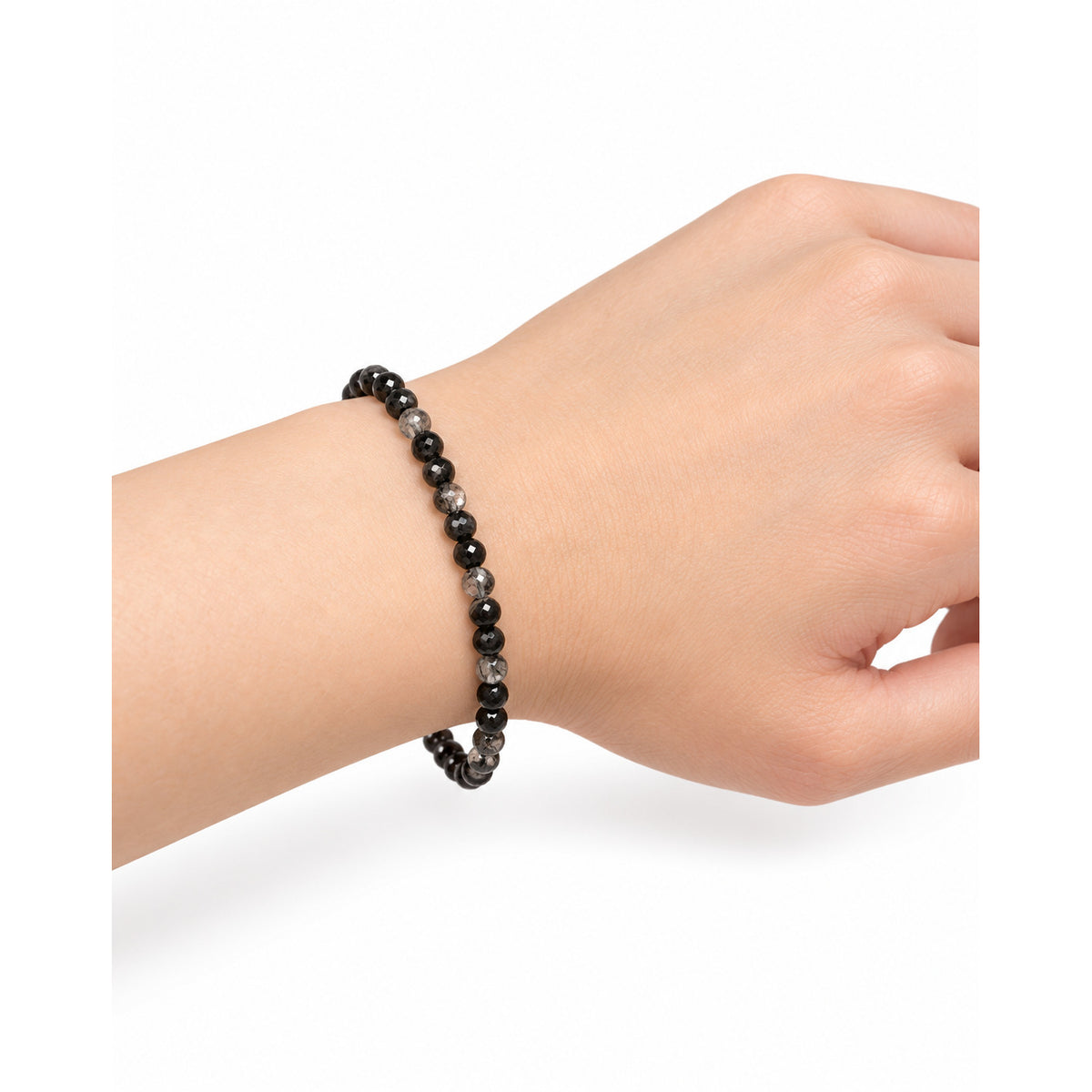 Tourmalinated Quartz Fine Bead Bracelet — wrist side view