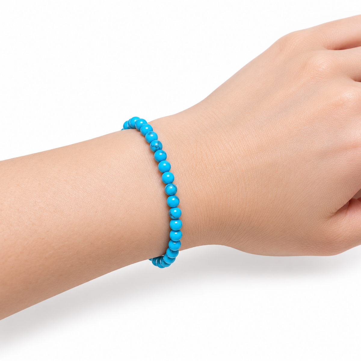 Blue Howlite Fine Bead Bracelet — wrist side view