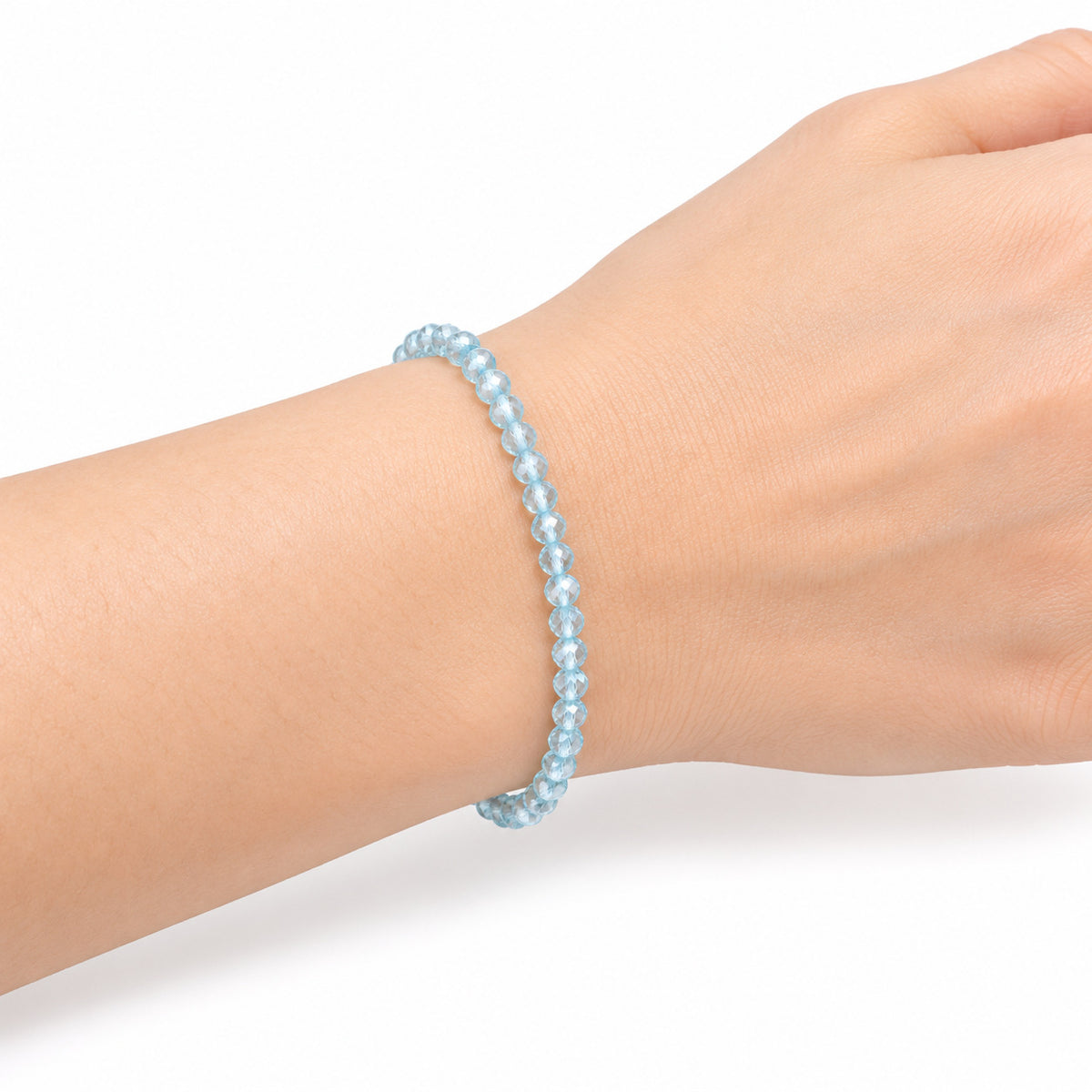 Blue Topaz Fine Bead Bracelet — wrist side view
