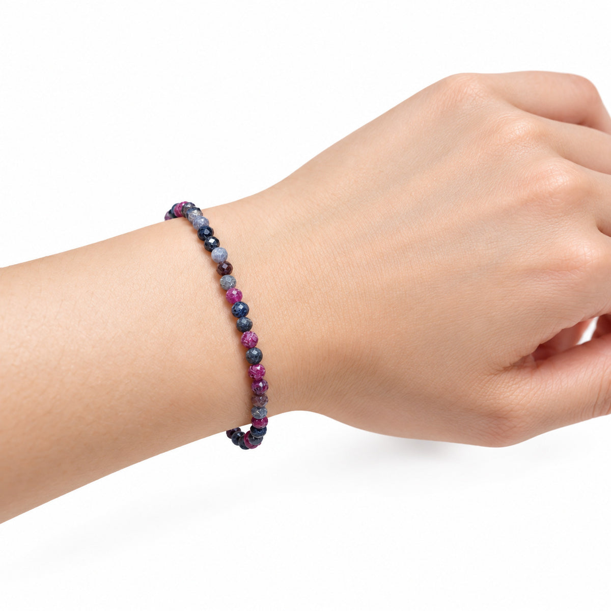 Ruby Sapphire Fine Bead Bracelet — wrist side view