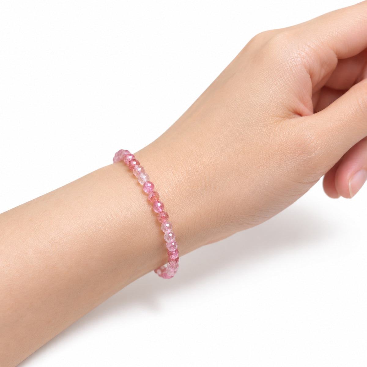 Strawberry Quartz Fine Bead Bracelet — wrist side view
