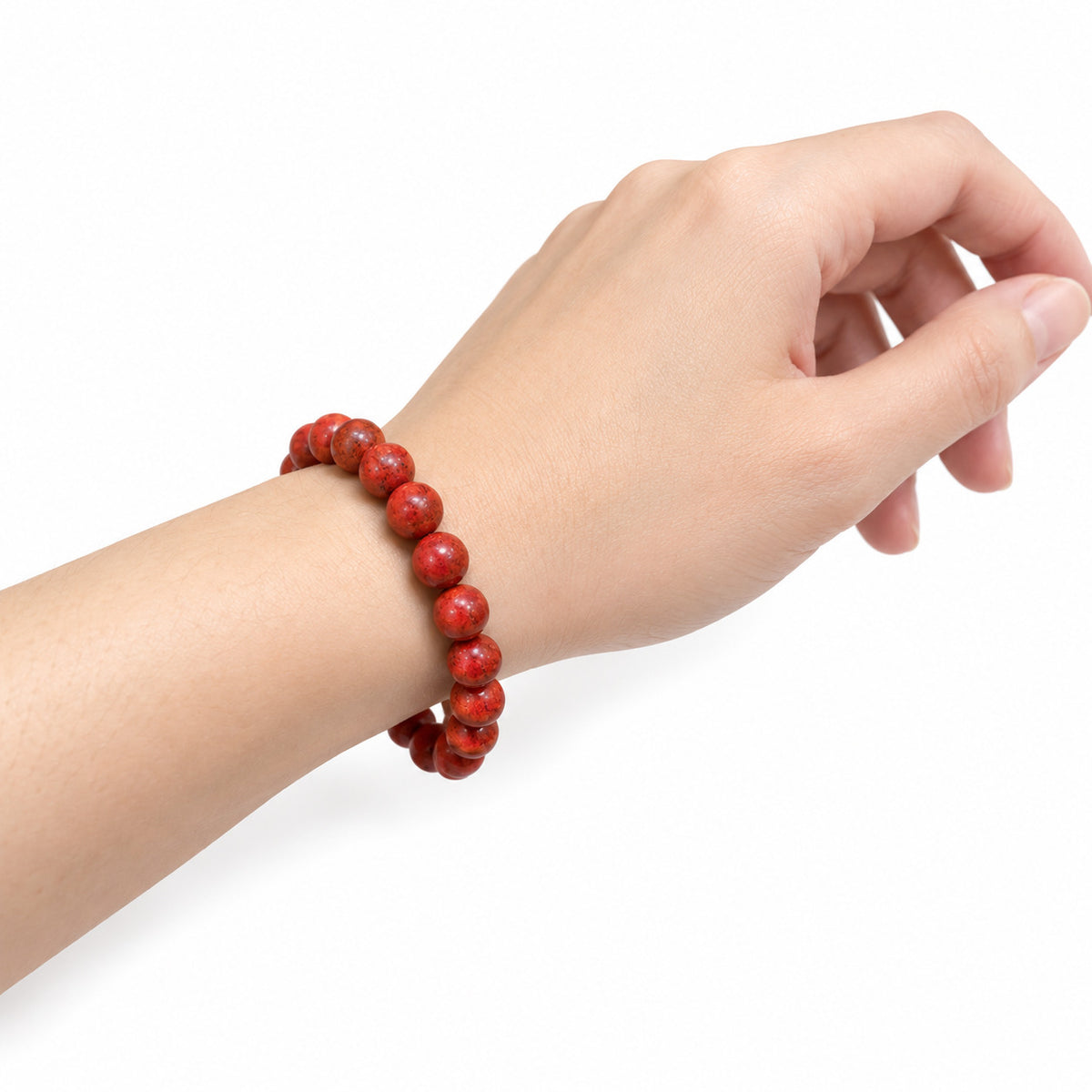 Natural Coral Bead Bracelet — wrist side view