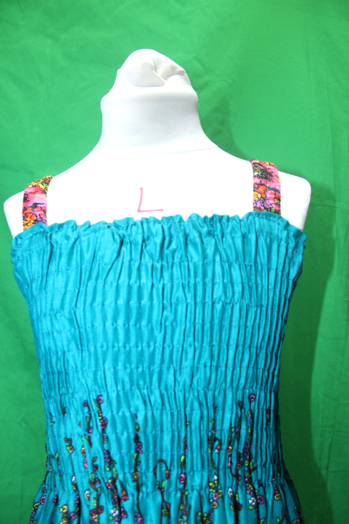 Turquoise Floral Border Smocked Dress - fabric and design detail