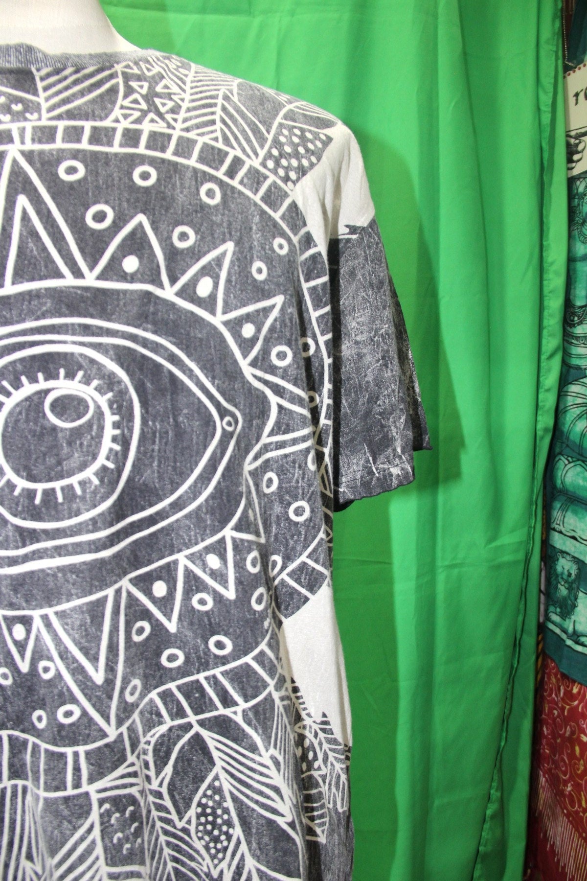 Black and White Feathers in Eyes from Thailand — garment detail