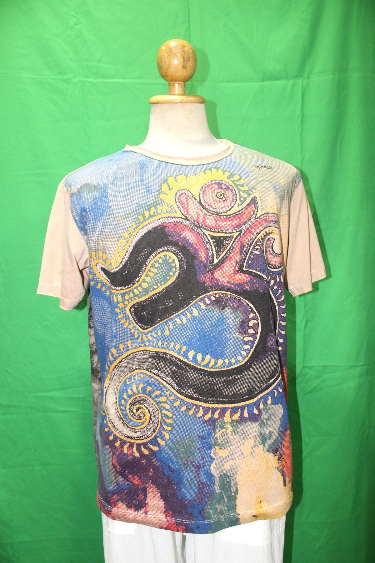 Light Brown Om in Holi Print from Thailand — garment detail