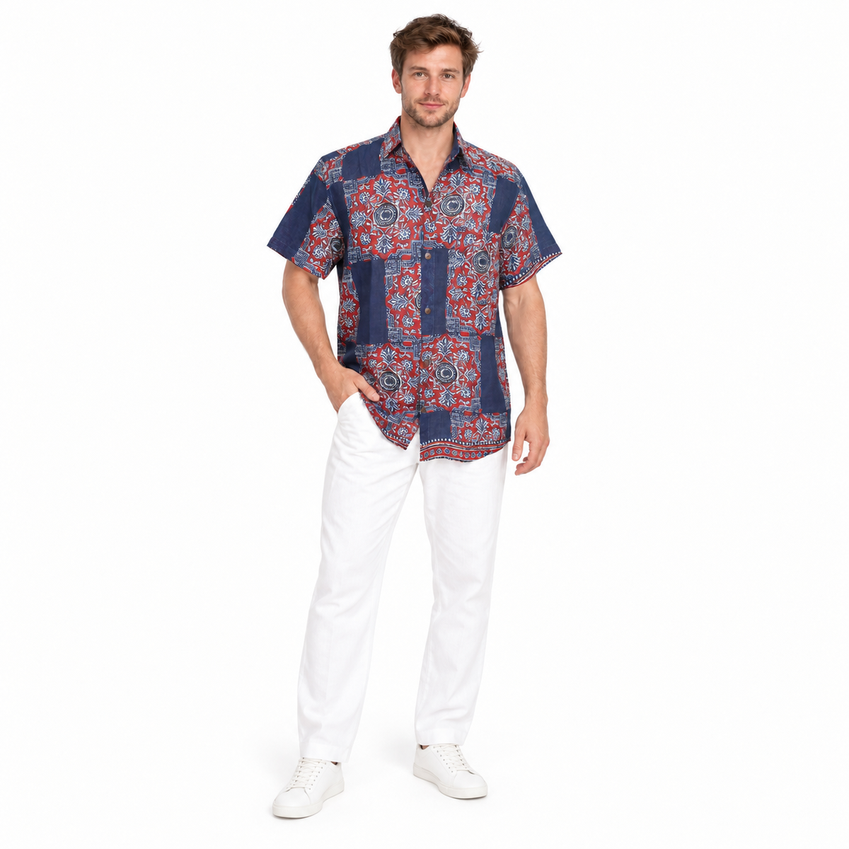 Full-length man wearing a navy and red mandala shirt