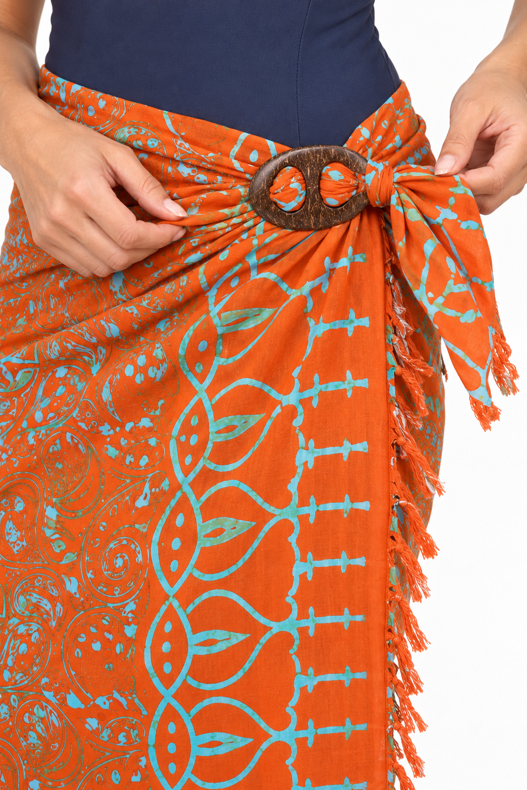 Orange Pale Blue Leaf Sarong — oval two-hole coconut buckle fastening detail